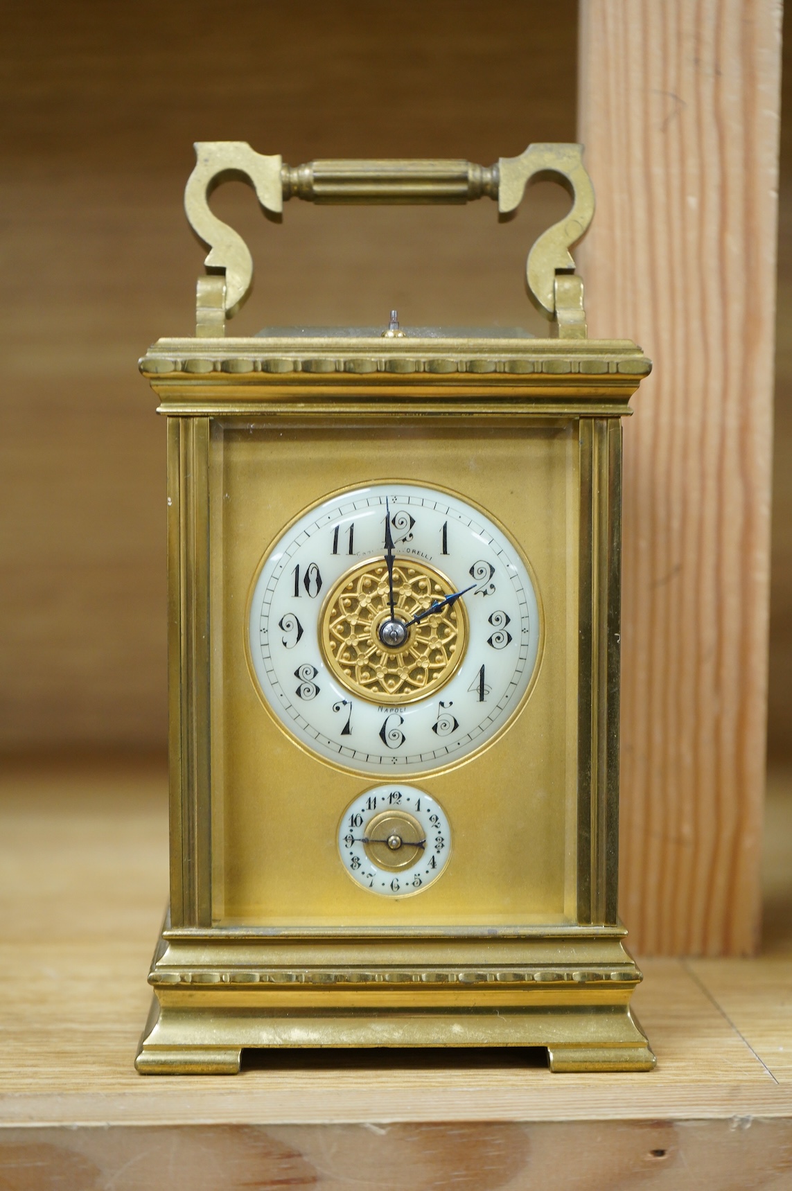 An early 20th century French brass cased carriage clock for the Italian market, with repeat, button missing, no key, 19cm high
